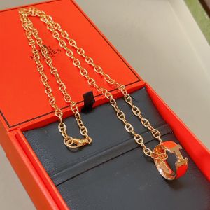 Hermes Enamel H Ring Pendant Necklace In Gold