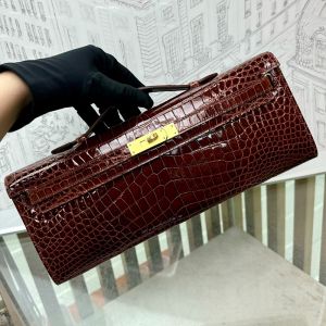 Hermes Kelly Cut Clutch Shinny Crocodile Leather Gold Hardware In Brown